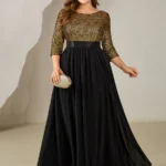 Plus size dlhé šaty pre moletky so zlatým flitrovaným vrchom, rukávmi po lakte a čiernou splývavou sukňou