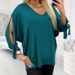 Elastická smaragdová tunika s rozstrihnutými rukávmi ozdobenými perličkami